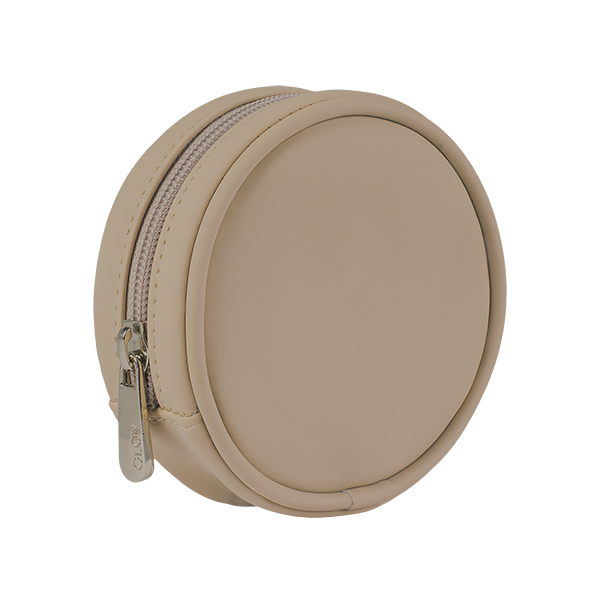 Compact, round cosmetic bag for storing accessories.